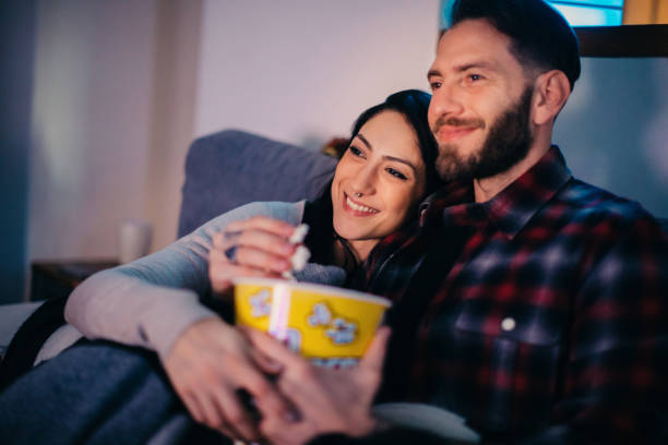 istock Couple Watching Movie 1220740330