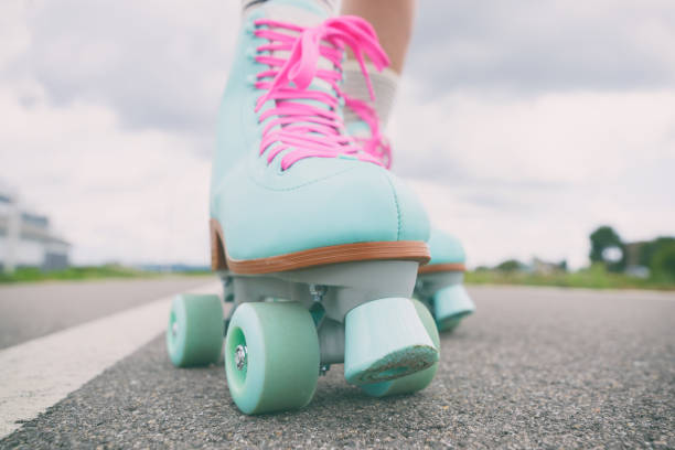 istock Woman wearing roller skates with pink laces 1220743977