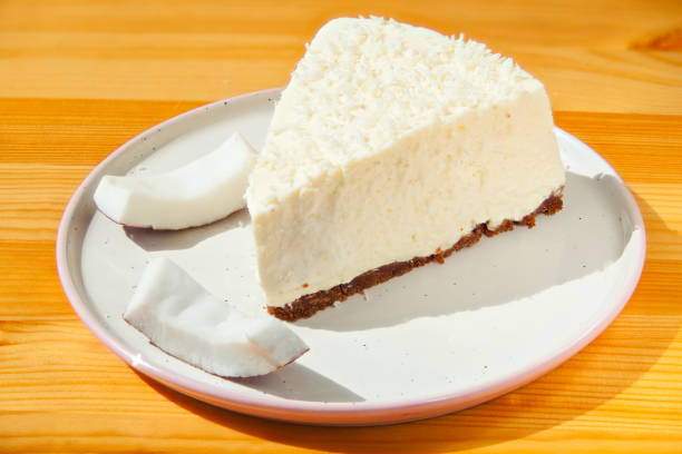 istock delicious cheesecake with coconut on  plate 1220745713