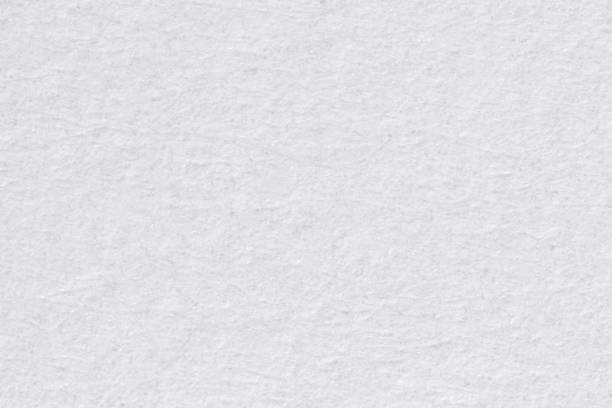 istock Close up of white paper seamless background. 1220747549