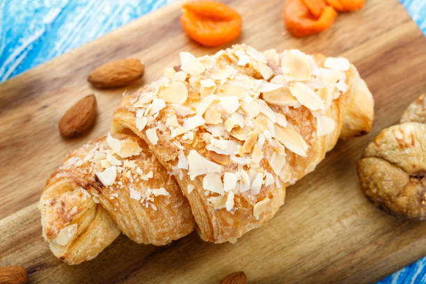 istock Fresh croissant and dried fruits on the table. 1220748279