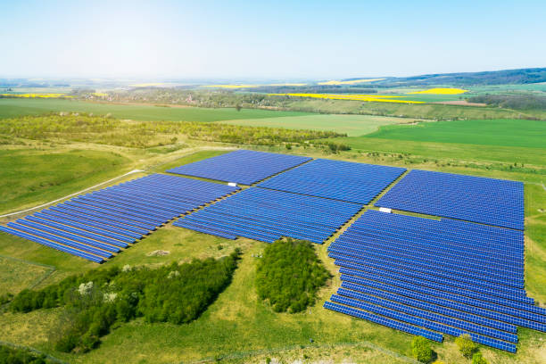 istock Aerial view of a Solar panel energy field in spring 1220749722
