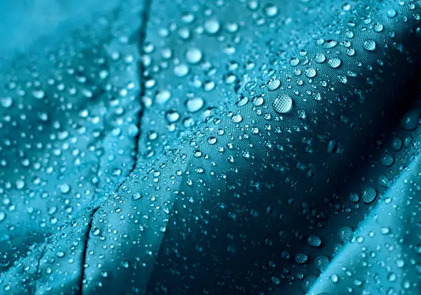 Photo of Water drops on the fabric.