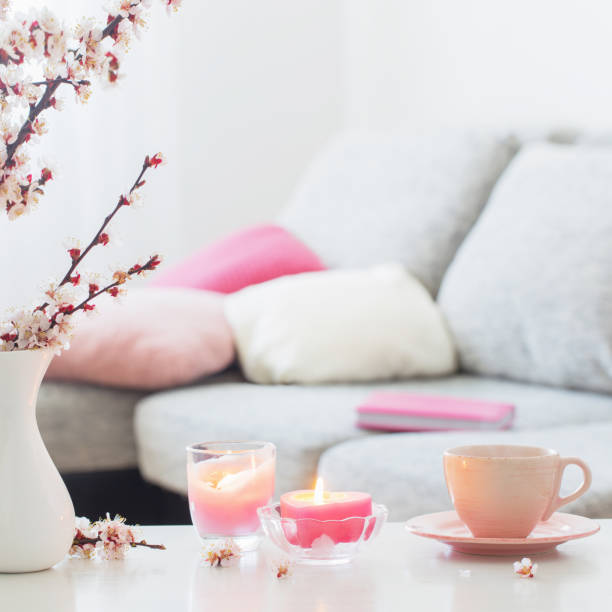 istock spring pink flowers in vase in white interior 1220761863