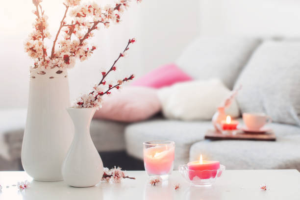 istock spring pink flowers in vase in white interior 1220761865