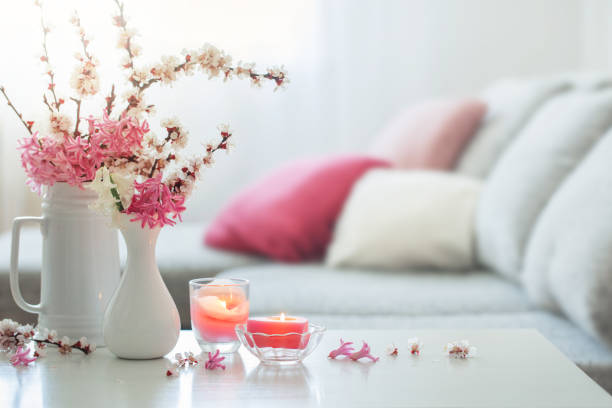 istock spring pink flowers in vase in white interior 1220761869