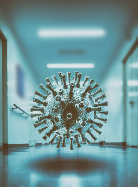 istock Corona Virus COVID-19 floating in empty hospital 1220764858