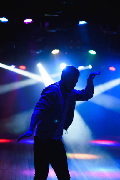 istock silhouette of male dancer 1220765167