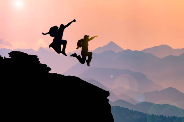 istock peak success of crazy, energetic and dynamic climbers 1220765689