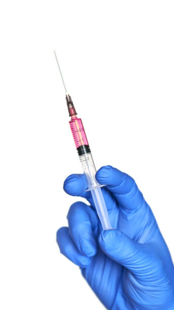 istock Hand in glove hold vaccine. 1220768684