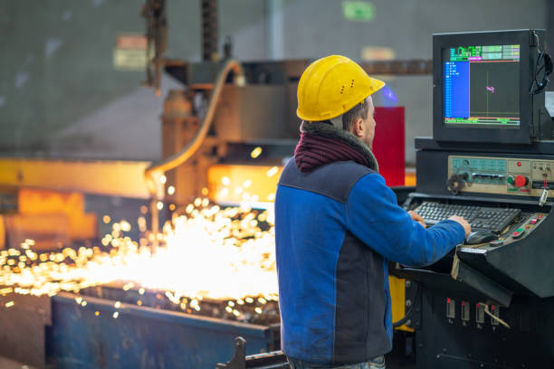 CNC operator is working CNC operator is working equipment accuracy laser flame stock pictures, royalty-free photos & images