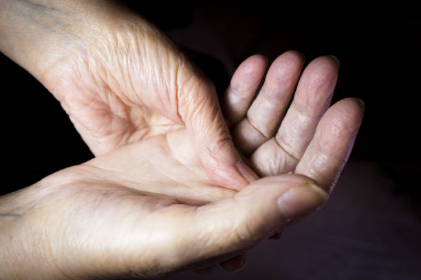 istock Hands of elderly woman doing a selfmassage. Manual physiotherapy 1220772849