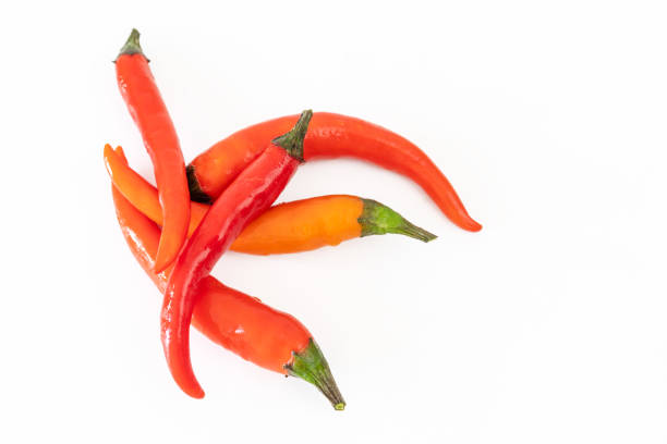 istock Thai Hot Peppers over White Background 1220772894