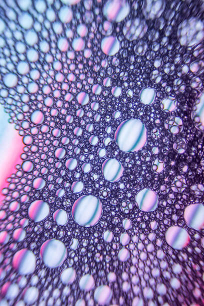 istock Abstract Bubbles Macro with amazing textures and blue and purple color 1220773042