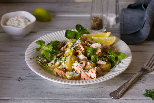 New Season Potato Salad with Poached Salmon New Season Potato Salad with Poached Salmon. Healthy diet food salad fruit lettuce spring stock pictures, royalty-free photos & images