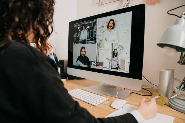 istock Young woman having a video call with her colleagues 1220777907