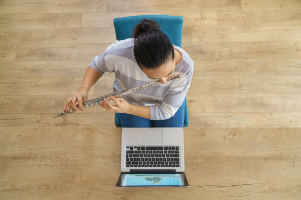istock Woman plays the flute 1220778455