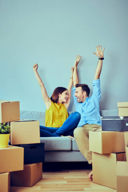 istock Excited young couple moving in 1220780161