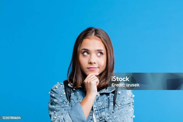 Portrait Of Pensive Teenege Girl Stock Photo - Download Image Now - Contemplation, Teenager, Adolescence