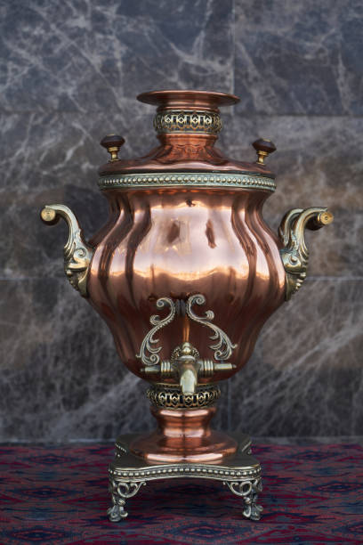istock Samovar, russian tea pot. Vintage samovar on marble background 1220783701