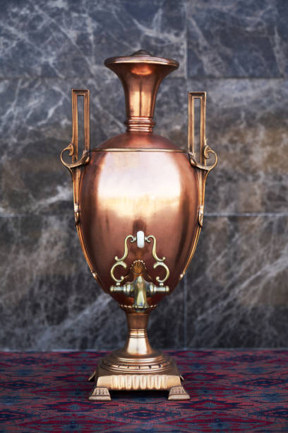 istock Samovar, russian tea pot. Vintage samovar on marble background 1220783725