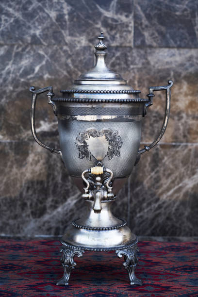 istock Samovar, russian tea pot. Vintage samovar on marble background 1220783732