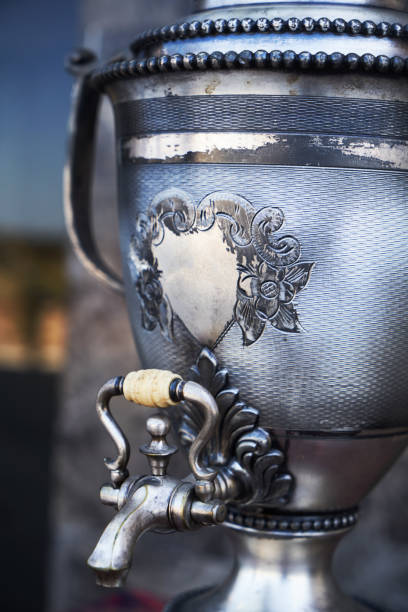 Samovar, russian tea pot. Vintage samovar on marble background, close-up