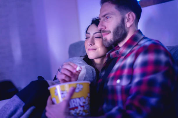 istock Couple Watching Movie 1220788092