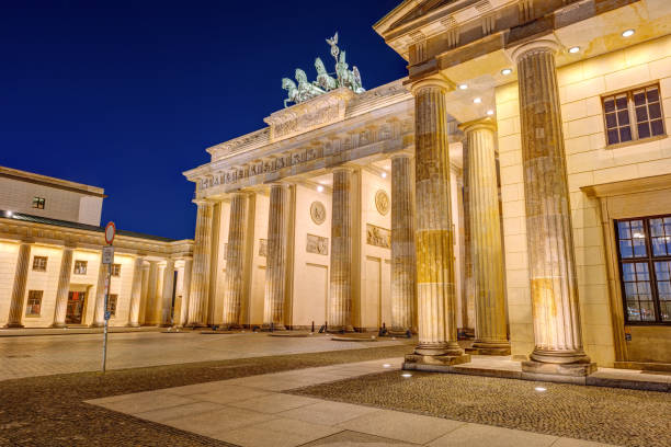 istock Lateral view of the illuminated Brandenburger Tor 1220789662
