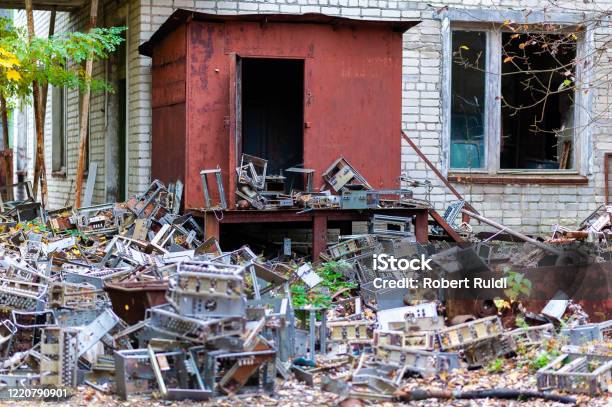 A Pile Of Electronic Scrap From The 1980s Lying Around In The Post Office Of Pripyat Chernobyl Exclusion Zone Stock Photo - Download Image Now
