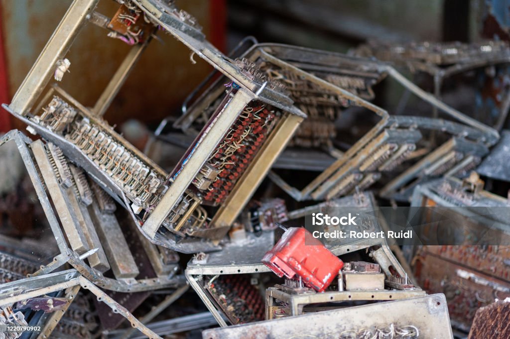 A pile of electronic scrap from the 1980s lying around in the post office of Pripyat, Chernobyl Exclusion Zone 1980-1989 Stock Photo