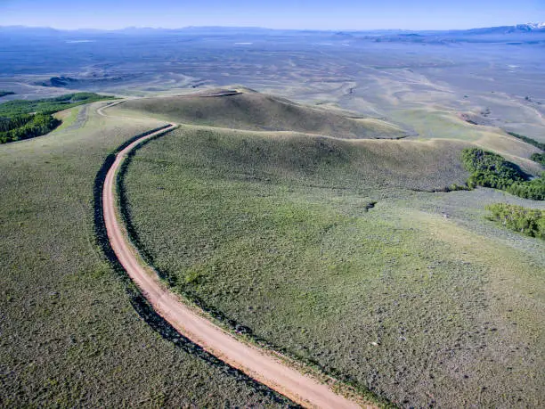 windy back country road aerial view - Independence Mountain Road in North Park, Colorado - aerial view towards Walden and North Platte RIver valley