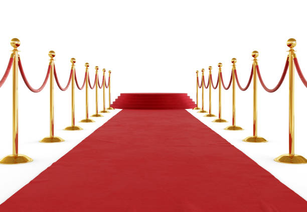 istock Golden barrier with red rope isolated on white background. Clipping path included 1220792869