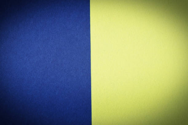 istock Colored background yellow and blue color chunks of felt fabric pattern 1220792883