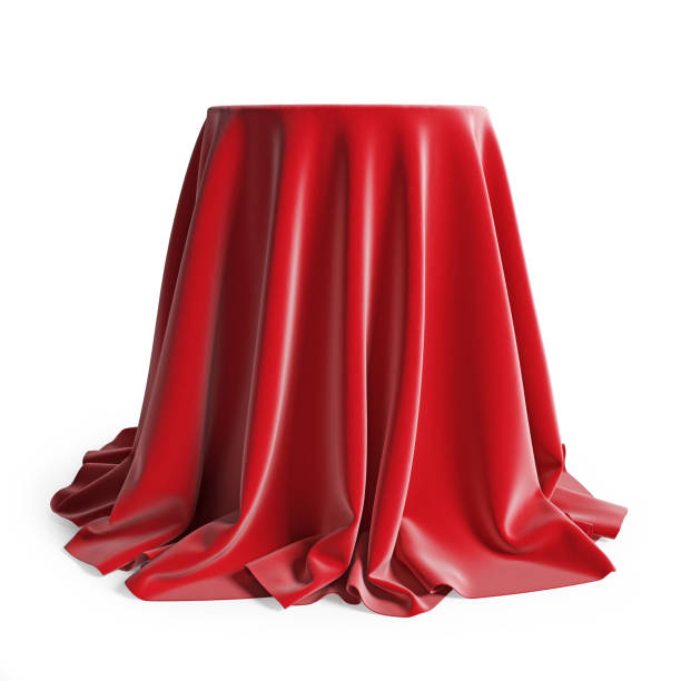 istock Round podium covered with red silk cloth. Isolated on a white background with clipping path. 1220792982