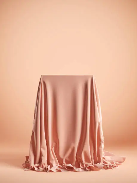 Presentation pedestal with pink silk cloth on a pink background. Isolated with clipping path. 3d illustration