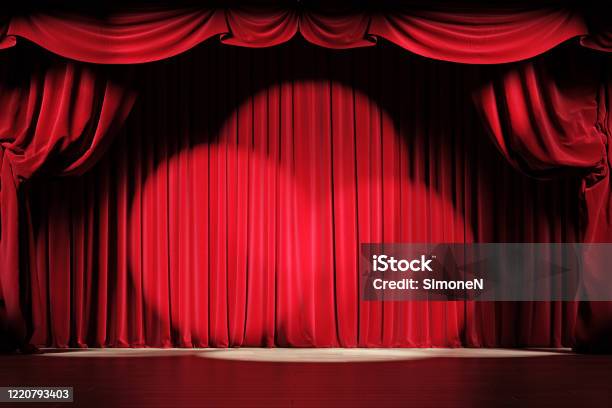 Theater Stage With Red Velvet Curtains And Spotlights Stock Photo - Download Image Now