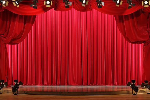 Empty theater stage with red velvet curtains and spotlights. 3d illustration