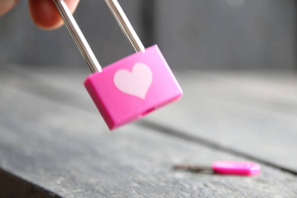 Lock and key to a heart for Valentines day. Love concept. Key and lock on the table.