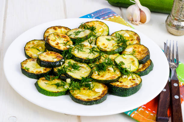 istock Grilled zucchini with garlic and herbs. Photo 1220794859