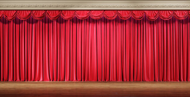 istock Empty theater stage with red velvet curtains. 1220794948