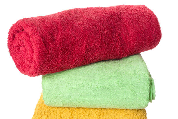 istock stack of colored Terry towels, isolated on  white background 1220795061