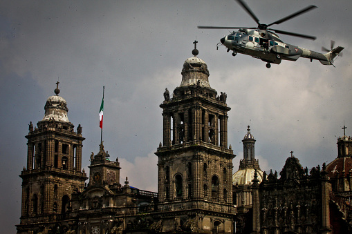 Mexico City, Mexico, September 16 -- A military helicopter during the parade of the Mexican armed forces in the Zocalo (Central Square) in the historic center of Mexico City on the occasion of the Independence Day solemnly celebrated across the country.