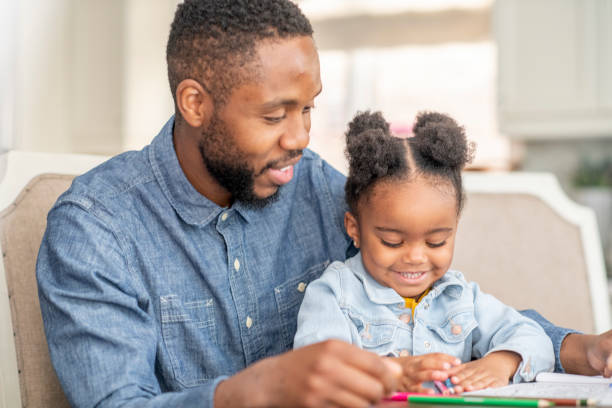 istock Father and daughter homeschool 1220801173