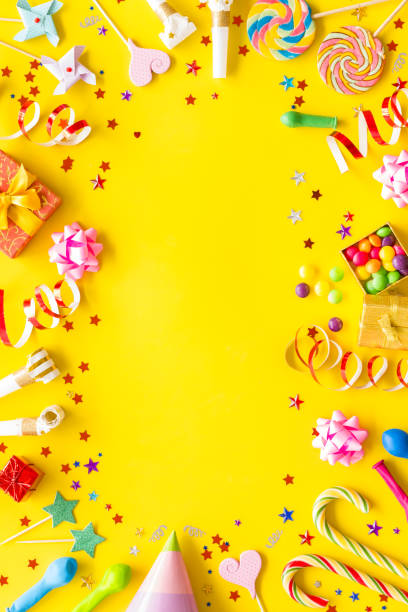 istock Decoration for party frame on yellow background top view mockup 1220801188