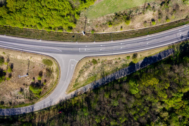 istock An Aerial Road Trip - forest with curved road 1220804445