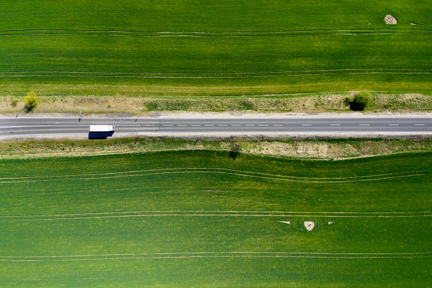 istock An Aerial Road Trip - forest with curved road 1220804463