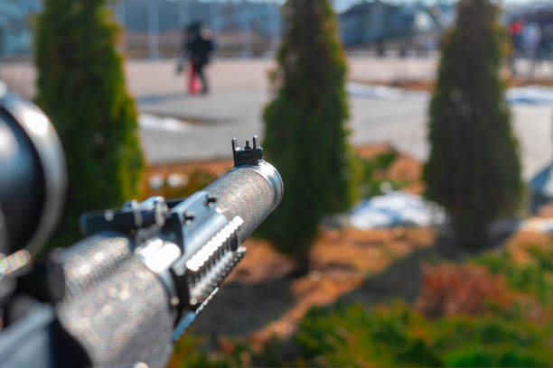istock Selective focus. Front sightt of a sniper rifle. Val Silenced Assault Rifle 1220807567