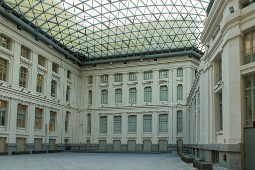 View of the glass gallery roof of the inner courtyard of the city hall complex in Madrid city, Spain.