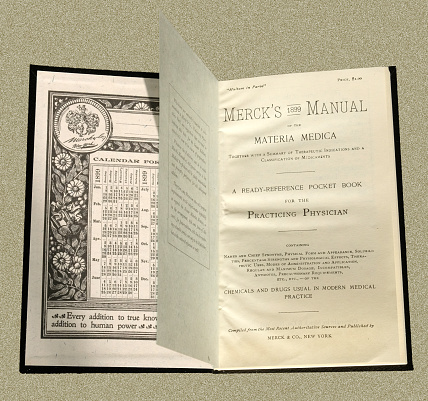 Photo of the front pages of the first edition of Merck's medical guide manual, published in New York in 1899